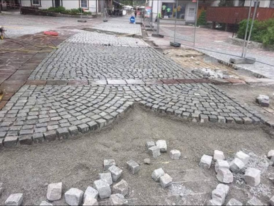 Decorative cobblestone paving with fan pattern